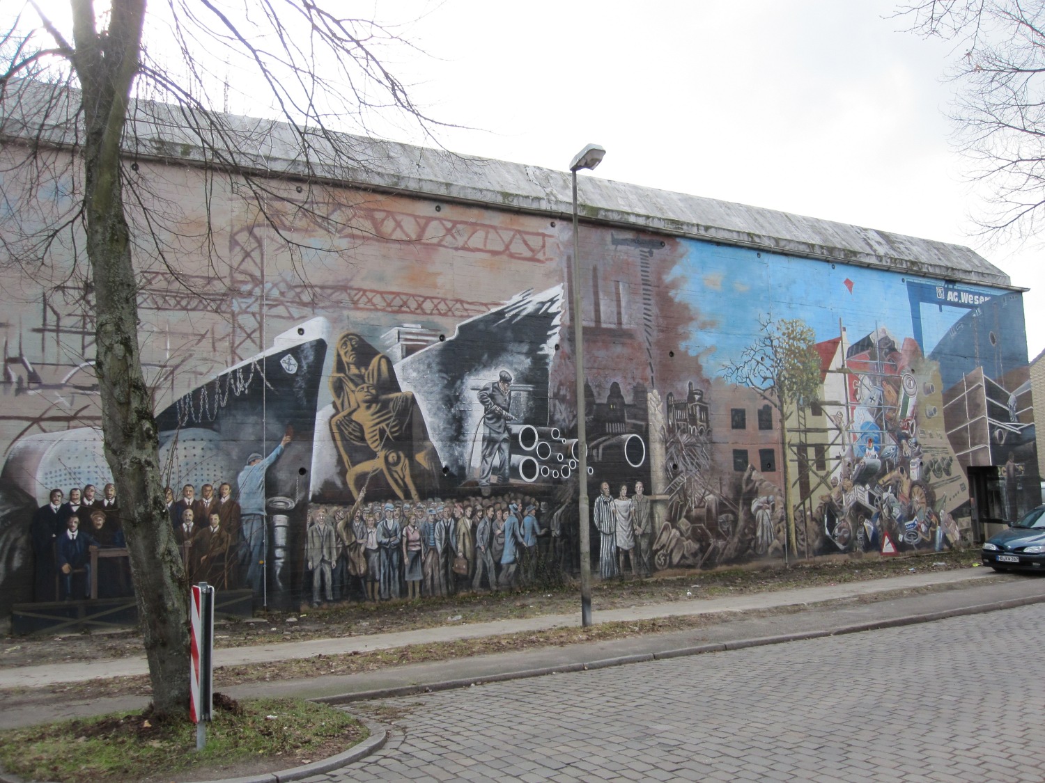 Das Bild zeigt die Bemalung des Bunkers auf der Seite des Pastorenwegs in der Grasberger Straße